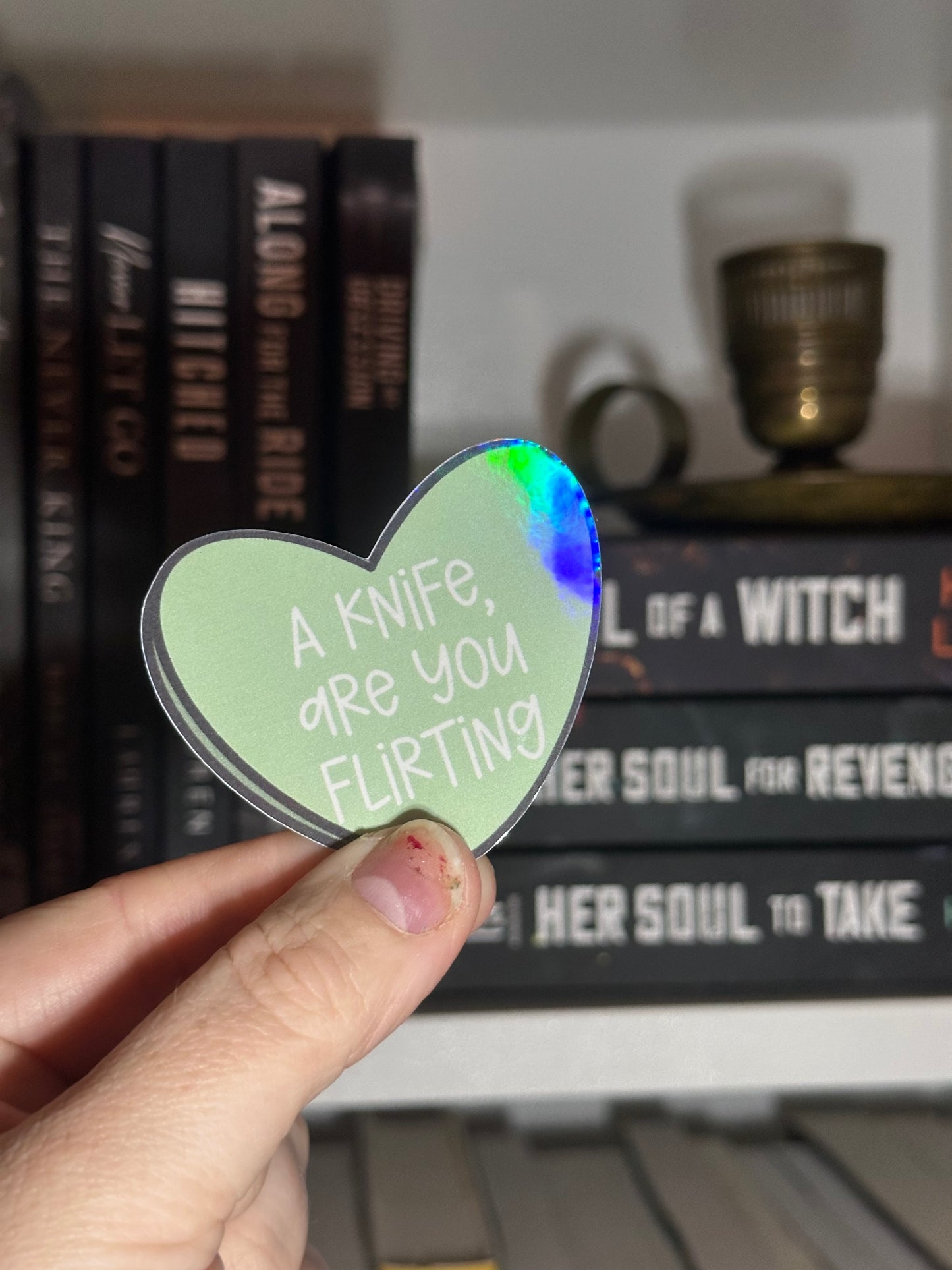 A knife candy heart sticker